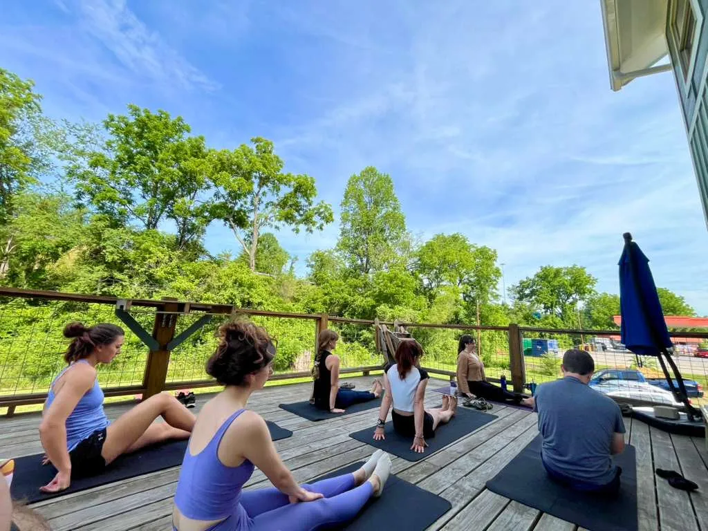 Weekly yoga class on the back porch at the hostel